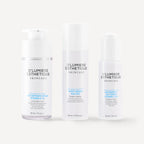 Three skincare bottles from D' Lumiere Esthetique on a white background