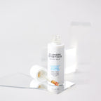 Skincare product with dropper on a white background