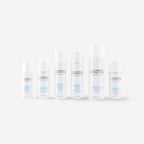 Set of skincare bottles labeled 'D'Lumiere Esthetique' on a white background