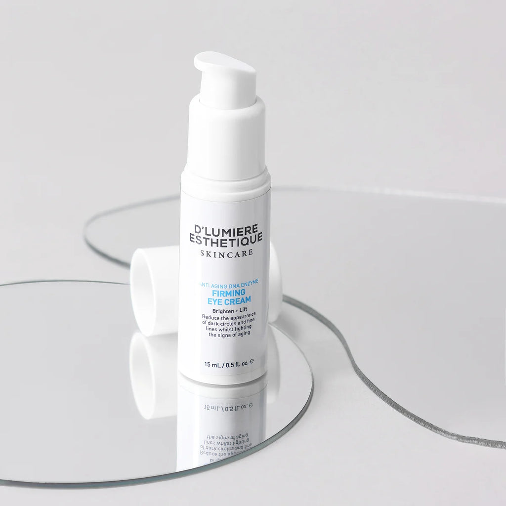 Skincare cream bottle with 'D'Lumiere Esthetique' branding on a clear glass stand.