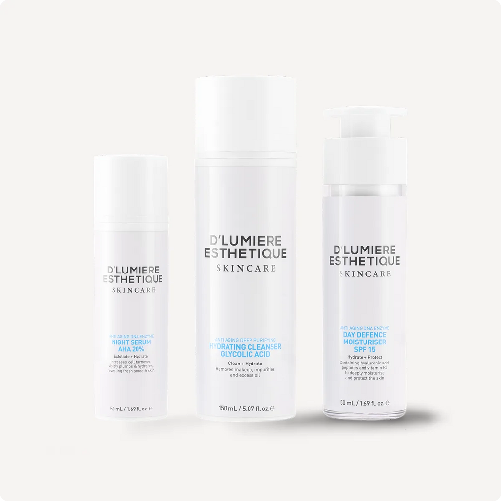 Three skincare bottles from D'lumiere Esthetique on a white background