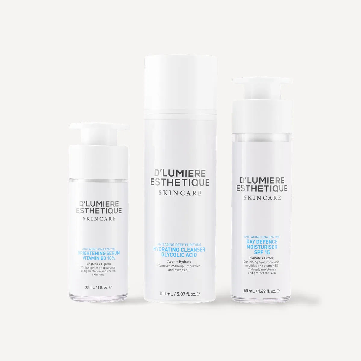 Three skincare bottles from D'Lumiere Esthetique on a white background